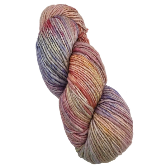 A single skein of variegated yarn with blended pastel colors including pink, purple, blue, and cream, photographed on a plain light background.