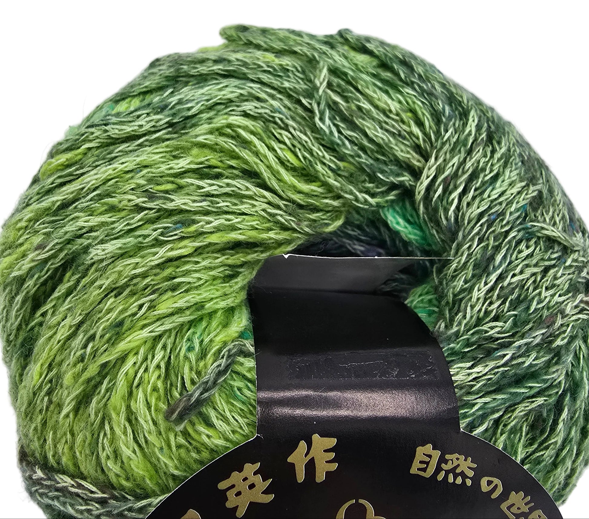 Close-up image of a Matsuri_by_Noro_yarn in_Color_3 with partial label on a white background.